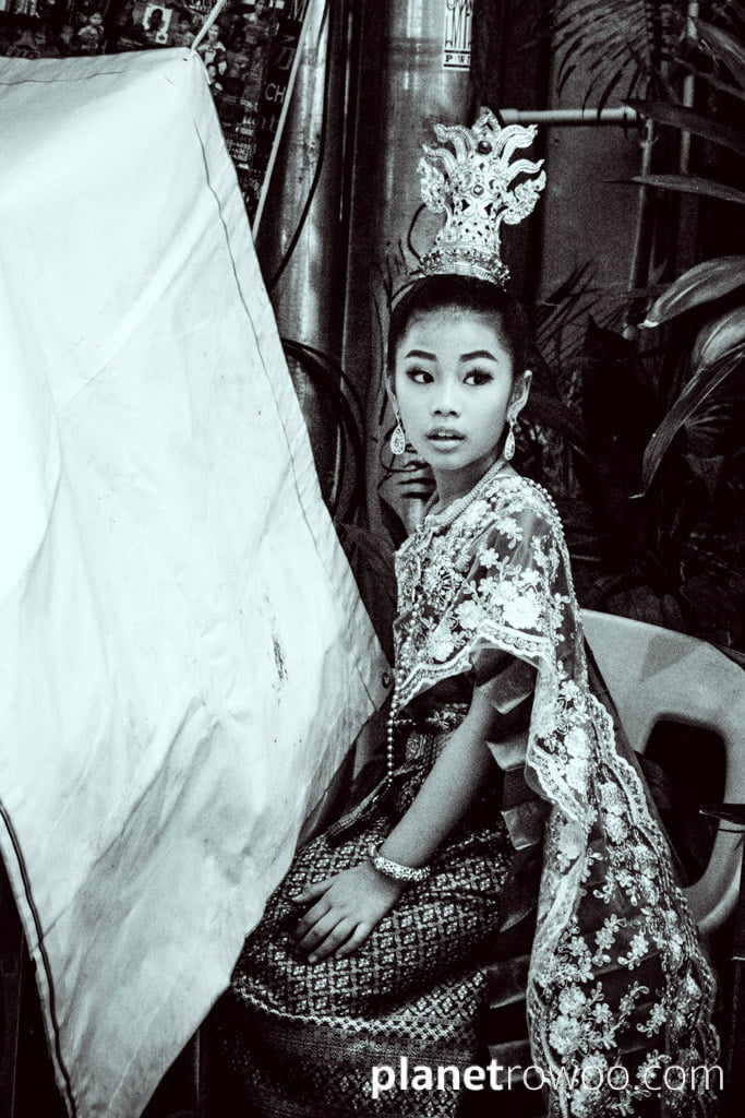 Girl in traditional dress for a beauty pageant at the Sunday Walking Street Market, Chiang Mai, Thailand, 2018