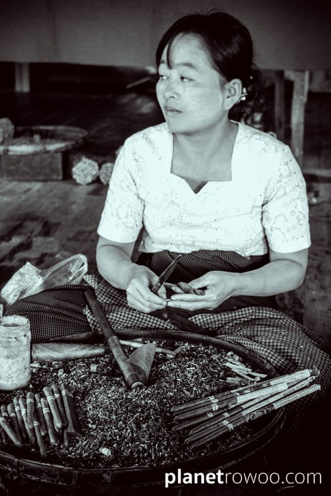 Cutting a cheroot, Inle Lake cheroot factory, Shan State, Myanmar, 2017