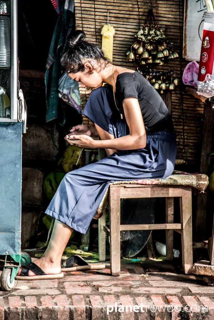 Girl on mobile, Luang Prabang, Laos, 2019