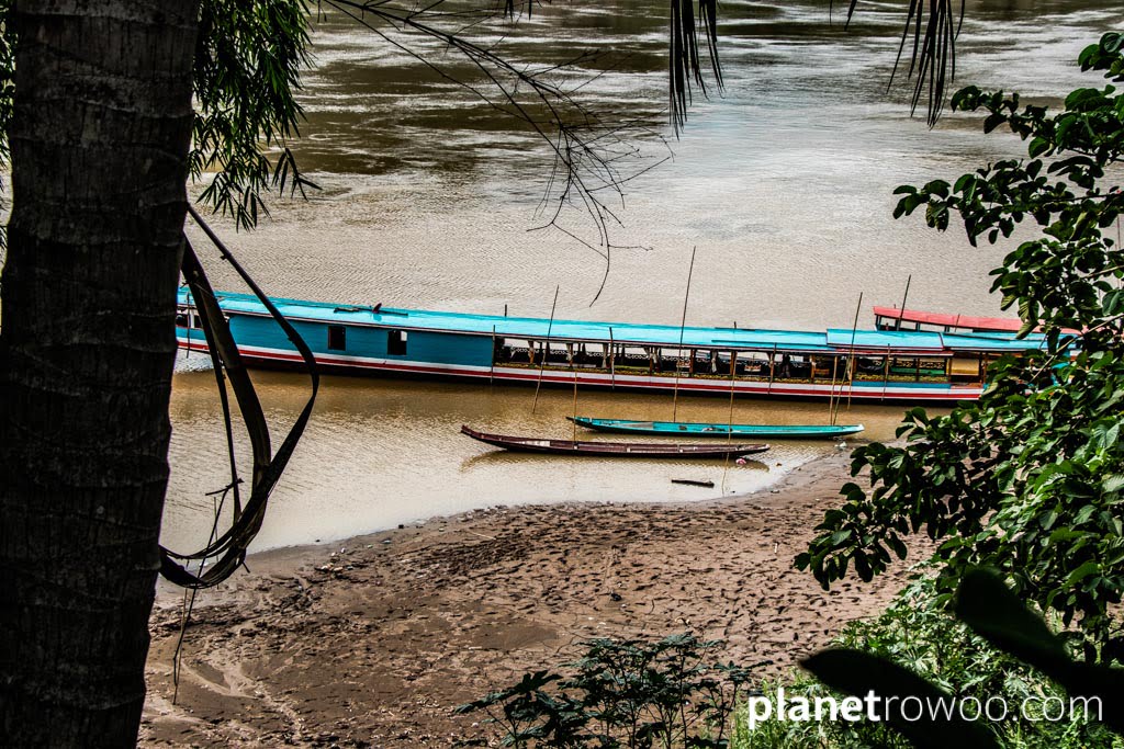 Laos traditional long boats on the Mekong River at Luang Prabang, Laos, 2019